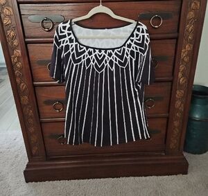 Black and White Graphic Tee with Intricate Neckline